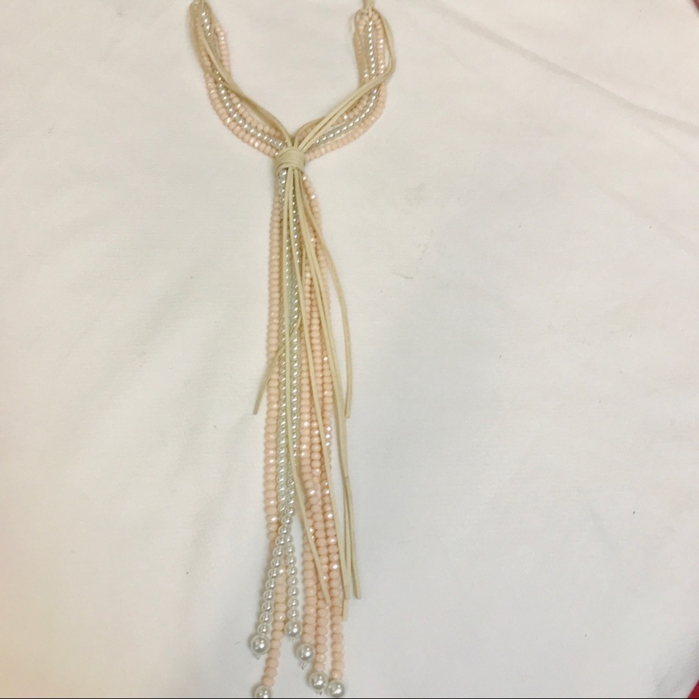Pearl and  pink beads with suede ties.